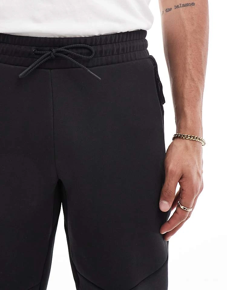 Puma Pumatech Track Pants In Puma Black For Men 4 Puma Pumatech Track Pants In Puma Black For Men - Image 4